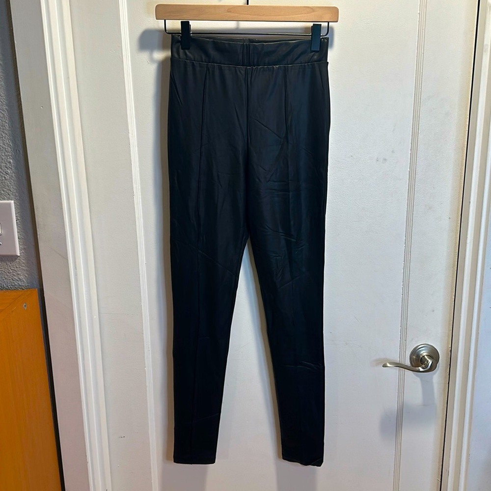 ASOS Design faux leather pleated leggings.